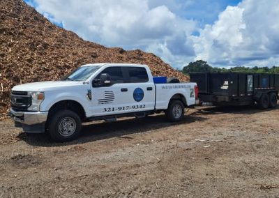 A truck during tree service in Titusville, FL